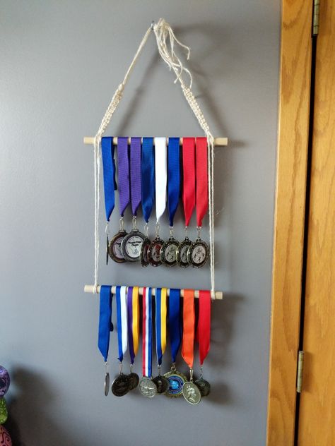 I wanted to display my medals so I created this macramé display! Sports Metal Display Ideas, Medal Holder Ideas Diy, Medal Hanger Ideas, How To Display Medals, Medal Holder Ideas, Medal Display Ideas Diy, Diy Medal Display, Medals Display Ideas, Medal Display Ideas