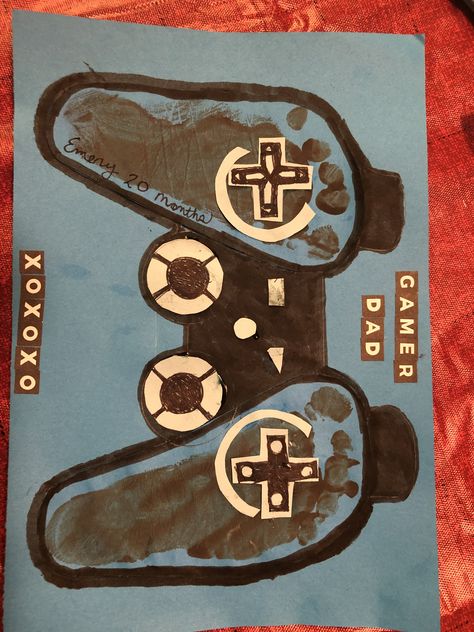 I just used a left and rigjt footprint to make a playstation video game controller. I cut out the small button pieces and glued them on in a lighter blue color than the background blue, so it would look lit up. Canvas Ideas For Fathers Day, Fathers Day Hand And Footprint Art, Father’s Day Crafts For Kids Video Games, Video Game Fathers Day Craft, Dad Footprint Crafts, Footprint Crafts For Dad, Diy Fathers Day Crafts Handmade Gifts, Baby Crafts For Dad, Video Game Crafts For Kids