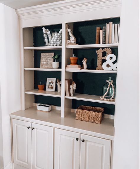 We gave our built in shelves a little more character with some black paint. Old Built In Shelves Makeover, Built In Cabinet Makeover, Built In Bookshelf Makeover, Built In Makeover, Painted Built Ins, Cupboard Decor, White Built Ins, Shelf Makeover, Office Shelves