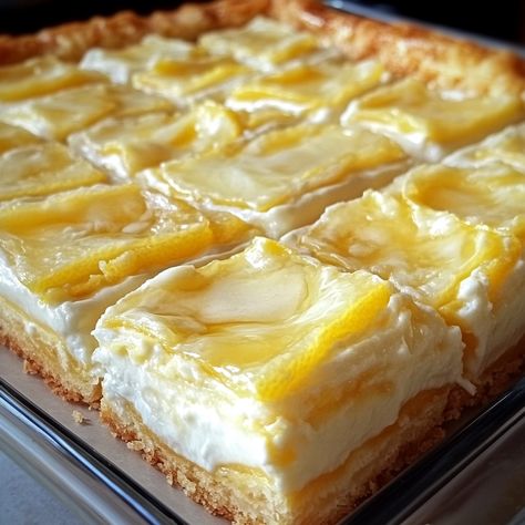 Sunshine Lemon Cream Cheese Squares Lemon Desserts With Cream Cheese, Lemon Cheesecake Squares, Creamy Lemon Squares Recipe, Cream Cheese Squares, Lemon Desserts Bars, Delicious Lemon Desserts, Lemon Squares Recipe, Lemon Desserts Easy, Lemon Cream Cheese Bars