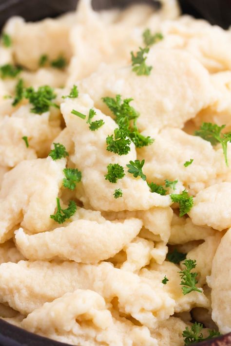 Learn how to make Nokedli or Hungarian dumplings, the perfect side dish for paprikash, goulash, or pörkölt. A fool-proof nokedli recipe for the best dumplings. #whereismyspoon #nokedli #nokedlirecipe #hungariandump-lings #hungariannokedli Hungarian Dumplings Chicken Paprikash, Polish Chicken And Dumplings, Halushki With Cabbage And Dumplings, Hungarian Chicken And Dumplings, Polish Potato Dumplings (kopytka) Recipe, Hungarian Sausage Dishes, Knoedel Recipe, Haluski Recipe Polish Dumplings, Czech Dumplings Recipe