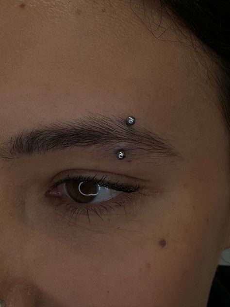 COME ON DOWN TO GET A BROW PIERCING 😎  EYEBROW PIERCING BY DANNY  Soho, Union Square, and Williamsburg  11AM-9PM 7 DAYS A/W🕘 WALK-INZ OR BOOK ONLINE..📕 TATTOOS & PIERCINGS, NO ATTITUDE, NO MISERABLE HOOPS TO JUMP THROUGH....🚫  WALK-INZ WELCOME OR BOOK ONLINE AT  ⚔️livebytheswordtattoo.com⚔️ . . . . #brow #eyebrowpiercing #piercing #nycpiercer #Brooklyn #williamsbrug Eye Brow Hoop Piercing, Eyebrow Piercing Placement Chart, Dainty Bridge Piercing, Brow Piercing Aesthetic, Left Eyebrow Piercing, Eyebrow Piercing With Glasses, Eye Brow Piercing Girl Aesthetic, Eyebrow Piercing Scar, Paired Nostril Piercing