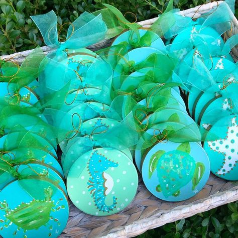 I have loved painting so many ornaments this year. Heading up to the studio to paint more today. I love rainy days when I get to stay home and paint😊  #turquoisechristmas #colorsofthesea #christmasornaments #coastalchristmas #coastalchristmasornaments #coastalchristmasdecor #clpicks #beachornaments #crabs #seahorses #seaturtles #starfish #beachlife #beachchristmas #beachchristmastree #beachchristmasdecor #lemondaisydesign #christmasdecor #christmasornaments #handpainted #etsygifts Coastal Christmas Ornaments, White Elephant Christmas, Christmas Hand Painted, Beach Christmas Decorations, Elephant Christmas, Coastal Ornament, Turquoise Christmas, Coastal Christmas Decor, Hand Painted Bottles