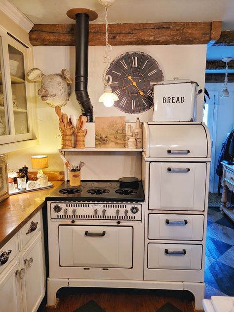 I love cooking on my 1920 Wedgewood stove. I bought it from a family in Tennessee and had it shipped to my home. It has two gas ovens, a broiler, warming area, storage area and six burners. If a gas range has a blue flame it is a fast cooker!!! . #gasrange #kitchen #stove #kitchen design. #wedgewood Stove Kitchen Design, Gas Ovens, Stove Kitchen, Blue Flame, Gas Oven, Kitchen Stove, Gas Range, Antique Wood, Wood Kitchen