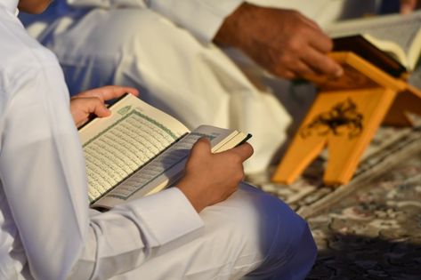 People reading the holy quran | Premium Photo #Freepik #photo #background #people #book #islamic Quran Memorization, Reading Quran, Quran Reading, People Reading, Sacred Scripture, Online Academy, Online Quran, Memorization, Islamic Studies