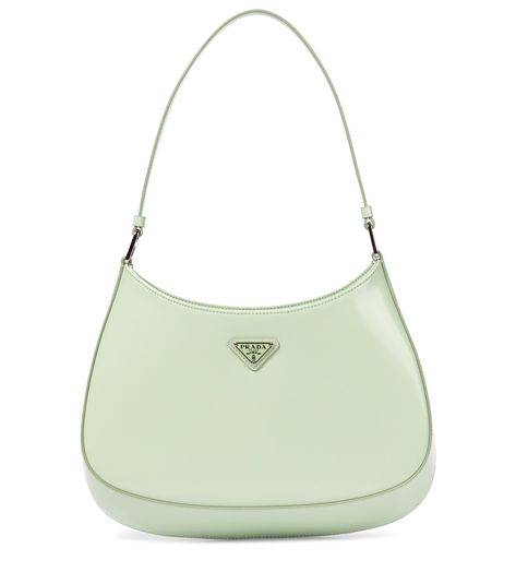 Prada - Cleo Small leather shoulder bag - Meet the newest member of the Prada bag family: the Cleo Small baguette bag. A modern interpretation of a style from the archives, this pistachio-green brushed-leather design is lined with signature nylon and finished with the iconic triangular emblem. Expect to see it on the arms of fashion's finest this season. seen @ www.mytheresa.com Green Prada Bag, Prada Cleo, Brand Name Bags, Girly Bags, Cute Handbags, Miuccia Prada, Fancy Bags, Baguette Bag, Cute Bags