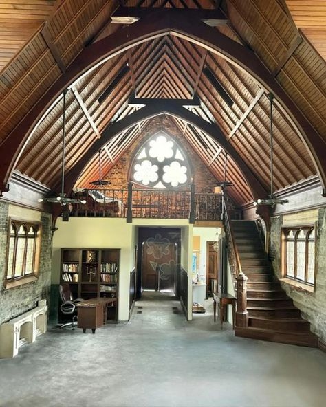 A near perfect church conversion home is selling for $350,000 and we're in love ❤️ Built in the early 1900s, this former house of worship boasts a handsome stone facade and a tall steeple. Thanks to a well-executed conversion, the interior of the former St. John’s Church truly shines. As the listing details put it, “This church is a unique and stunning property that seamlessly blends historic charm with modern living.” On the lower level, you’ll find a one-bedroom apartment with original b... Church Home Conversion, Church Conversions Home, Renovated Churches Into Homes, Church House Conversion, Church Converted To Home, Converted Church House, Chapel Conversion, Converted Church, Men House