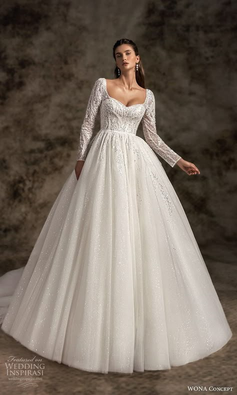 Weddinginspirasi.com featuring - wona concept 2023 bridal long sleeve sweetheart square queen anne neckline heavily embellished bodice a line ball gown wedding dress chapel train (6) mv -- First Look: Wona Concept 2023 Wedding Dresses #wedding #weddings #bridal #weddingdress #weddingdresses #bride #fashion #collection:Notted’Opera #label:WONÁ #week:282022 #year:2023 ~ Lace Wedding Gowns With Sleeves, Princess Wedding Dresses With Lace Sleeves, Royals Wedding Dresses, Ball Gown Dresses Elegant Classy, Modest Wedding Dresses With Sleeves Lace, Long Sleeve Square Neck Wedding Dress, Covered Back Wedding Dress, Winter Wedding Dress With Sleeves, Wedding Ball Gown With Sleeves