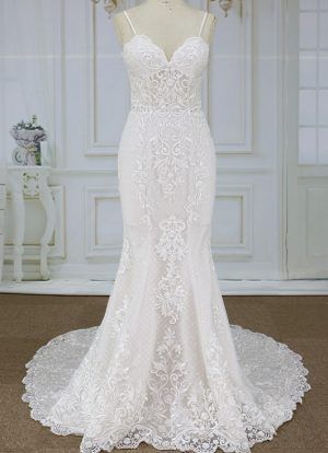 “Ornate wedding dresses with #beautiful embroidery are available frrom our design firm.  This #bridal gown has removable #spaghetti #straps.  The fitted #style is also flattering. We specialize in custom #weddingdresses for #brides of all shapes & sizes.  In addition to #custom #dresses we can also make #replications of #hautecouture #bridalgowns too.  Find out more info on embroidered #wedding dresses & custom #womensfashion for your wedding when you email us directly.” Lace Fishtail Wedding Dress, Affordable Bridal Dresses, Wedding Dress Fishtail, Mermaid Wedding Dress With Sleeves, Cheap Wedding Dress Boho, Backless Mermaid Wedding Dresses, White Bridal Gown, Wedding Dresses Hippie, Vintage Lace Weddings