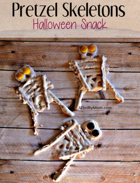 pretzel skeletons, halloween snack, #Halloween, #halloweensnack,#Halloweengoodies,#halloweenparty, #thriftyhalloweensnacks, #thriftysnackideas, #pretzels, #candycoating, #halloweencandy, #falltreatideas, #halloweentreats Pretzel Skeletons, Kid Friendly Halloween Crafts, Spider Cupcakes Halloween, Snack Halloween, Banana Ghosts, Halloween Pretzels, Halloween Themed Food, Skeletons Halloween, Pumpkin Candy Corn