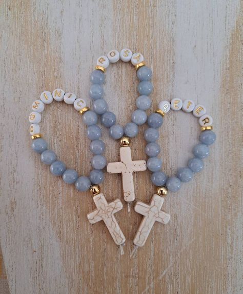 A spin on my original and popular finger rosary, these now come personalized by popular demand and available in rose gold, gold, bronze silver and gunmetal  If you have an special requests or want a combination of metals, stones, names etc please message me.  These rosaries are bulk discounted, please select qty from drop down menu. Please message me names or add them into the comment box upon checkout Finger Rosary, Cross Favors, Mini Rosaries, First Communion Favors, Communion Favors, Beaded Bookmarks, Diy Jewlery, Catholic Jewelry, Baptism Favors