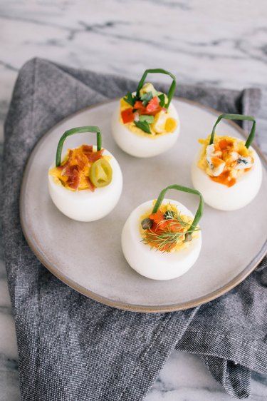 How to Make Deviled Egg Baskets | eHow Easter Basket Deviled Eggs, Deviled Egg Baskets, Cute Deviled Eggs, Deviled Eggs Easter, Deviled Egg Recipes, Easter Deviled Eggs, Classic Deviled Eggs, Halloween Birthday Parties, Egg Baskets