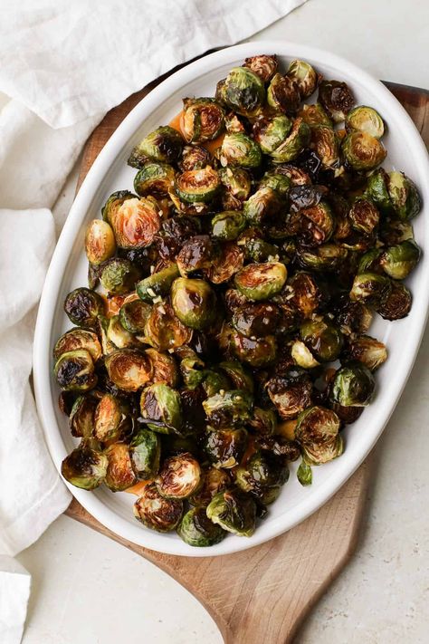 Crispy Roasted Hot Honey Brussels Sprouts - A Nourishing Plate Honey Roasted Brussel Sprouts, Honey Sriracha Brussel Sprouts, Homemade Hot Honey, Honey Brussel Sprouts, Butternut Squash Bacon, Hot Honey Sauce, Crispy Brussel Sprouts, Brussel Sprout Recipes Roasted, Roasted Sprouts