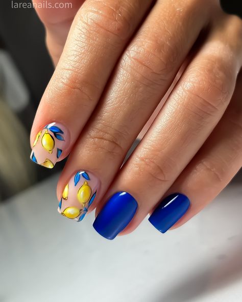 Brighten up your summer look with a blue manicure 💙 inspired by the iconic Dolce & Gabbana lemon print. 🍋🍋🍋 This vibrant nail art combines the refreshing hues of Royal blues with the zesty yellow of lemons, capturing the essence of sunny days and citrus groves. @lareanetwork #dolcegabbana #larea #njnails #russianmanicurenj #lareanails #lareanailsnj #lemonprint #lemonnails Amalfi Coast Nails Ideas, Blue And Yellow Lemon Nails, Blue And Yellow Nail Art Designs, Almafi Coast Nails, Lemon Inspired Nails, Summer Italy Nails, Italy Nail Art, Lemon And Blue Nails, Italy Themed Nails