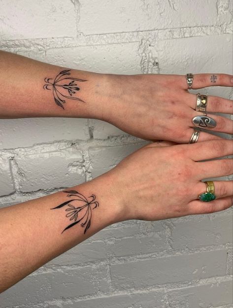 Hand To Forearm Tattoos For Women, Symmetrical Forearm Tattoo, Wrapping Tattoo Arm, Double Arm Tattoo, Inverse Tattoo Negative Space, Wrap Around Wrist Tattoos Non Floral, Fka Twigs Tattoo, Symmetrical Wrist Tattoo, Matching Thumb Tattoos