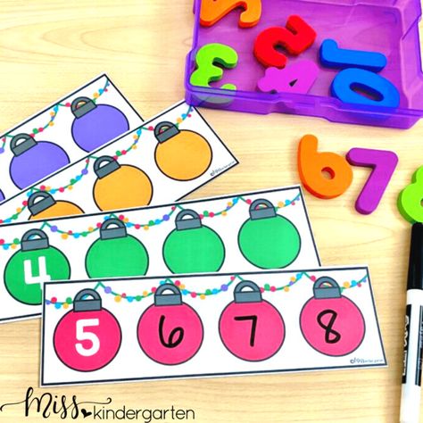 Use these December monthly centers to help your Kindergartners practice skills like counting, make a ten, literacy, word families, ending sounds, CVC words, and sight words. These engaging centers include winter and Christmas-themed activities your students will love completing during center time in the month of December. You will love the easy to organize no-prep activities you can use every December in your classroom. #Centers #DecemberCenters #WinterCenters #CenterActivities #KinderCenters Christmas Cvc Words, December Centers Kindergarten, Kindergarten Christmas Centers, Christmas Centers Kindergarten, December Centers, Make A Ten, Natalie Lynn, Kinder Centers, December Kindergarten