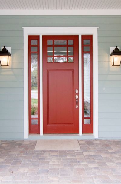 31 Houses with Red Front Entry Door Ideas | Sebring Design Build Red Front Doors With Glass Panels, Burnt Red Front Door, Houses With Red Front Doors, Red Front Door Decor, Red Front Door Ideas, Red Door Yellow Door, Red Front Doors, Entry Door Ideas, Red Entry Door