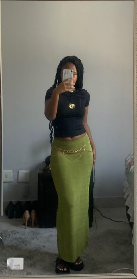 black girl wearing sage green maxi skirt and tight black top, with gold chain belt and gold star necklace Green Fitted Top Outfit, Green Skirt With Black Top, Green Maxi Skirt Outfit Aesthetic, What Top To Wear With Maxi Skirt, Black Women Maxi Skirt Outfit, Cute Long Skirt Outfits Black Women, How To Style Long Maxi Skirt, Maxi Fitted Skirt, Sage Green Maxi Skirt