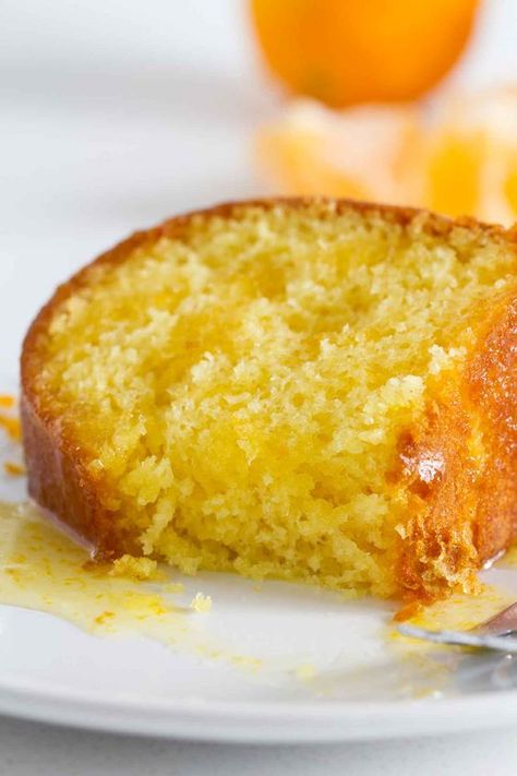 Moist and delicious, this Orange Glazed Bundt Cake starts with an easy citrus bundt cake that is covered in a sticky, sweet orange glaze. This cake is always a hit! Glazed Bundt Cake, Pineapple Juice Cake, Pineapple Dessert, Orange Bundt Cake, Tropical Desserts, Orange Cake Recipe, Lemon Bundt Cake, Orange Glaze, Vegetarian Cake