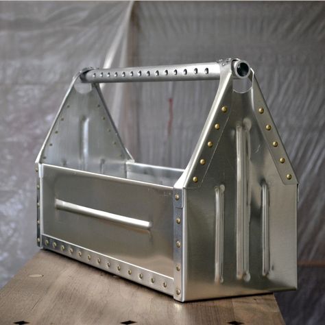 Aluminum sheet metal toolbox, aircraft rivets, cross-drilled handle, bead rolled panels. A fun, handmade project. Sheet Metal Crafts, Aluminum Sheet Metal, Sheet Metal Work, Sheet Metal Tools, Metal Tool Box, Wooden Tool Boxes, Metal Ideas, Metal Shaping, Sheet Metal Fabrication