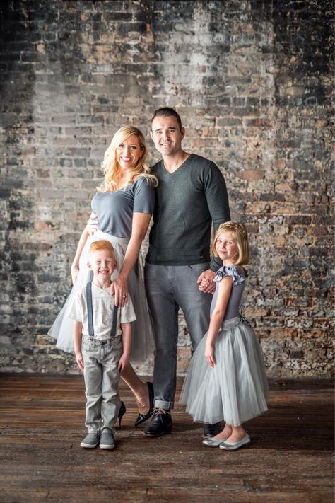 Family photos, gray tulle, mom and daughter tutus, neutral family photos, exposed brick wall Family Photos Gray Outfits, Family Photo Brick Wall, Family Pictures Brick Wall, Brick Wall Family Photoshoot, Gray Family Picture Outfits, Elegant Family Photoshoot, Neutral Family Photos, Fall Photo Outfits, Family Photos What To Wear