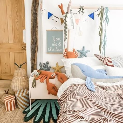 7 Ways Decorate an Ocean Themed Nursery — Alphadorable | Custom nursery art and decor Pink Cupboard, Sea Kids Room, Ocean Kids Room, Seaside Bedroom, Sea Bedrooms, Ocean Bedroom, Ocean Room Decor, Ocean Themed Bedroom, Pink Ground