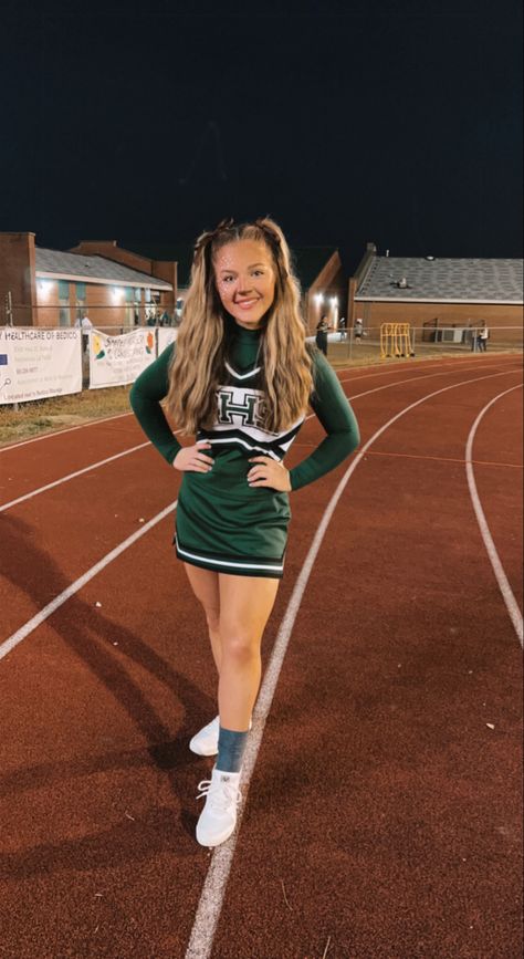 Green Cheerleader Aesthetic, Aesthetic Cheerleader Outfits, Vintage Cheer Uniform, Green Cheerleader Uniform, Cheerleading Senior Pictures, Tglc Cheer Uniform 2022, Spirit Finger, Cheer Poses, Cheer Uniform