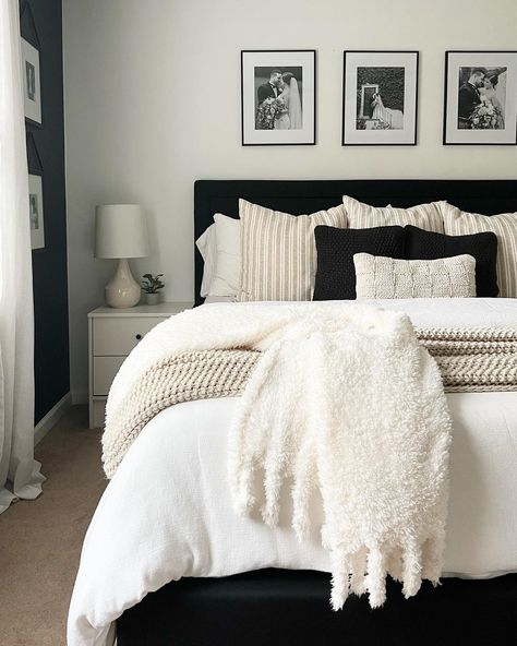 Black Headboard White Furniture, Black White And Beige Bedroom Minimalist, Black Bed White Nightstand, Guest Room Black Bed, White Bedding Black Accents, Black Pillows On Bed, Back Wall Of Bed Designs, Black Bed With White Bedding, Black Bed Frame White Bedding