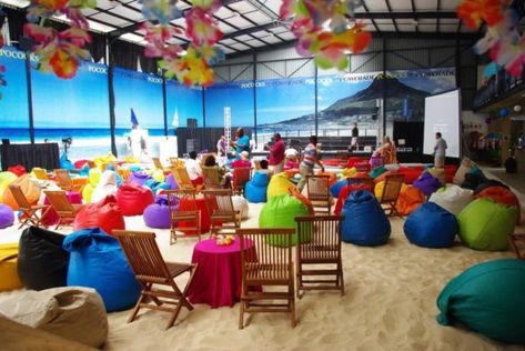 Colorful bean bag seating on indoor-style beach reflecting the skills to be an event planner Indoor Beach Party, Beach Party Games, Event Planning Contract, Event Planning Themes, Indoor Beach, Event Planning Career, Party Seating, Beach Party Decorations, Corporate Event Planning