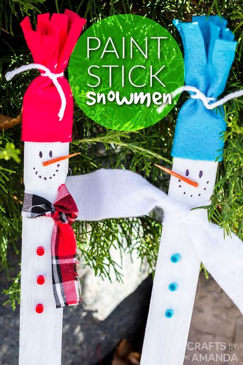 Craft Stick Snowman, Paint Stirrer Snowman, Paint Stick Holiday Crafts, Winter Crafts For Senior Citizens, Paint Stick Ornaments, Crafts With Paint Sticks, Paint Stirrer Crafts, Paint Stick Christmas Crafts, Winter Crafts For Teens