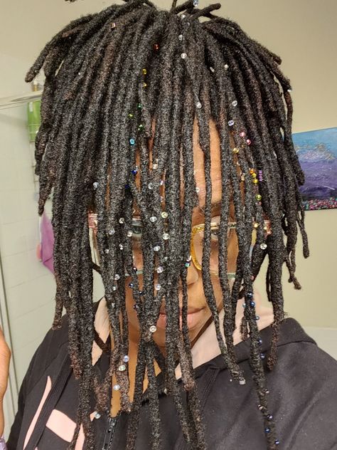 Locs with glass beads and metal charms Sparkle Locs, Sprinkle Locs, Loc Sprinkles Locks, Future Dreads, Microlocs Inspiration, Loc Sprinkles, Pretty Locs, Loc Goals, Sprinkle Sprinkle