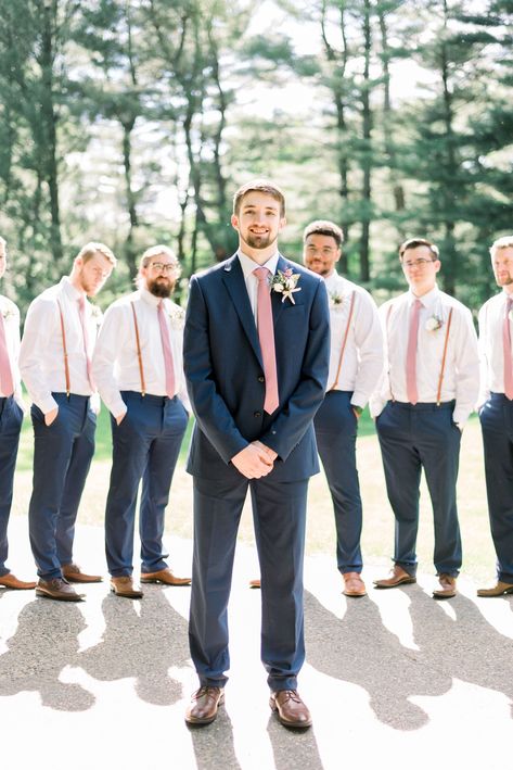 Dark Navy And Blush Wedding, Navy Pants With Suspenders Groomsmen, Blush And Navy Wedding Groomsmen, Navy Pink Groomsmen, Navy Blue Suspenders And Pink Bow Tie, Navy And Pink Homecoming Couple, Groomsmen Attire Navy And Blush, Blush Pink And Navy Blue Wedding Groomsmen Suits, Navy Groomsmen Pink Bridesmaids