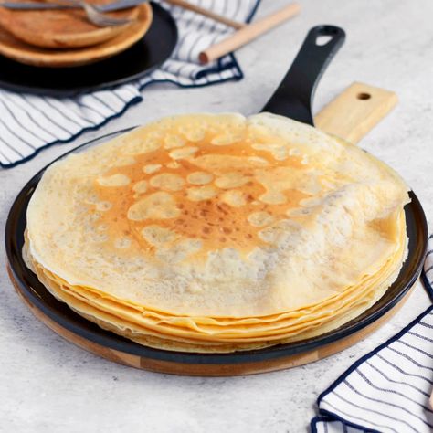 This easy crepe recipe makes the best classic French Crepes! With its detailed step by step photos, this recipe will show you exactly how to make crepes from scratch at home. This Simple and Basic Homemade Sweet Crepe Recipe is absolutely delicious for breakfast, tea time or as a dessert with your choice of sweet filling or toppings. Authentic Crepe Recipe, Authentic French Crepes Recipe, Simple Crepe Recipe, French Crepes Recipe, French Pancakes, French Crepe Recipe, Sweet Crepes Recipe, Crepe Suzette, Cook Breakfast