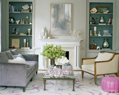 A painting by Loren MacIver is flanked by displays of ceramics, shells, and mercury glass in the living room of Ali Wentworth and George Stephanopoulos. Book Shelf Styling, Styling A Bookcase, Painting Bookcase, Bookcase Styling, Coastal Bedrooms, Casa Exterior, Built In Bookcase, Celebrity Houses, A Living Room