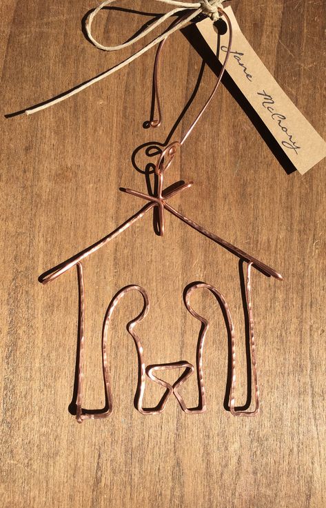 This Manger Scene Ornament is handmade in the Mississippi Delta. This is the perfect Christmas ornament for anyone celebrating the birth of Jesus !  Each ornament is sealed with a spray lacquer.  Measurements: Ornament: (without hanger) approximately 2 1/2 inches by 3 1/2inches  hook: adds approximately 2 inches to the length Wire Nativity Scene, Copper Wire Christmas Ornaments, Copper Wire Ornaments, Wig Jig Patterns Free, Nativity Ornaments Diy, Metal Wire Crafts, Manger Scene Ornament, Wire Christmas Ornaments, Barb Wire Crafts