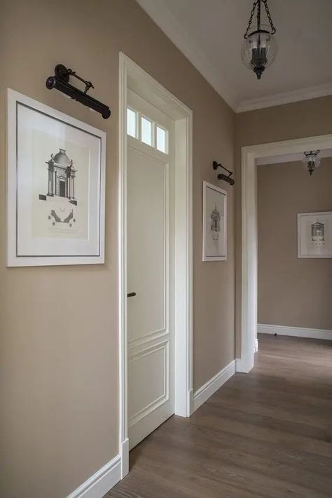 a stylish greige entryway with white touches, artworks and a vintage pendant lamp is a chic space with an elegant color scheme Minimalist Bedrooms, Korean House, Japanese Minimalist, Home Hall Design, Living Room Decor Colors, Dining Design, Decor Home Living Room, Design Living Room, Paint Colors For Home