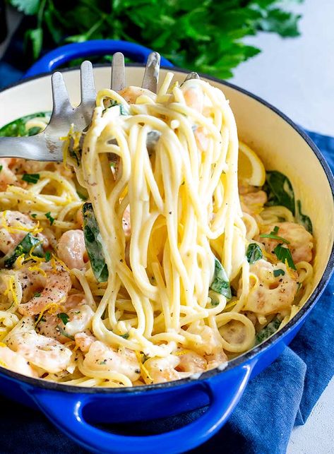 For an elegant yet easy dinner recipe why not try this Creamy Lemon Shrimp Pasta. It is ready in just 20 minutes and tastes like something you would get in a fine dining restaurant. Perfectly cooked shrimp/prawns, with a creamy rich lemon sauce, plenty of garlic and swirls of spaghetti, make this recipe so delicious. Serve it on date night or when you have friends over. Or serve it up as a special treat for the whole family. Simple Shrimp Pasta, Creamy Lemon Shrimp, Garlic Prawn, Lemon Shrimp Pasta, Creamy Shrimp Pasta, Lemon Cream Sauces, Lemon Shrimp, Cooked Shrimp, Spiral Pasta