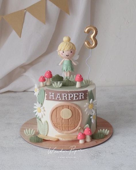 Simple Fairy Cake Ideas, Fairy Theme Cake Design, Fairy Princess Cake, Birthday Cake Tinkerbell Theme, 2 Tier Tinkerbell Cake, Tinkerbell Doll Cake, Fairy Birthday Themes, Tinkerbell Birthday Cakes, Lily Cake