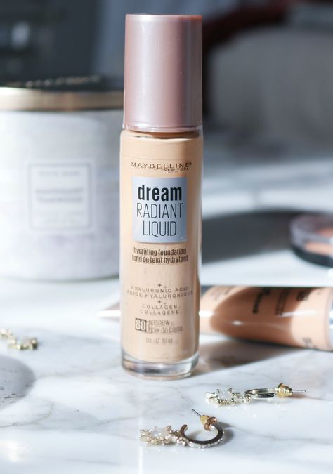 The new Maybelline Dream Radiant liquid foundation promises all-day hydration with a beautiful glowy finish. Does it perform as well as I hoped? You may recall that last year Maybelline dropped the Dream Urban Cover foundation to rave reviews. With full-coverage, SPF 50 and an incredibly long wear-time at only $12.99, there wasn’t much youRead More The post The New Maybelline Dream Radiant Liquid Foundation appeared first on Dream in Lace. Maybelline Dream Radiant Liquid, Maybelline Glow Foundation, Dream Radiant Liquid Foundation, Maybelline Matte Foundation, Maybelline Fit Me Foundation Pump, Maybelline Foundation, Maybelline Fit Me Foundation, Nars Sheer Glow Foundation, Nars Sheer Glow