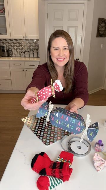 How To Wrap Tube Presents, Gift Card Wrapping Ideas Birthday, Wrapping Socks For Christmas, Wrapping Small Items, How To Gift Wrap Clothes With Paper, How To Wrap A Gift Like A Candy, Candy Gift Wrap, How To Wrap Candy, Candy Gift Wrapping Ideas