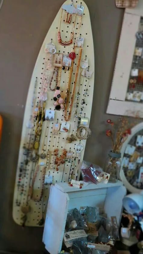 Vintage metal ironing board repurposed to jewelry display. Repurposed Metal Ironing Board, Ironing Board Ideas, Vintage Jewelry Display, Antique Booth Ideas, Ironing Boards, Jewerly Displays, Craft Fairs Booth, Craft Booth Displays, Diy Jewelry Display