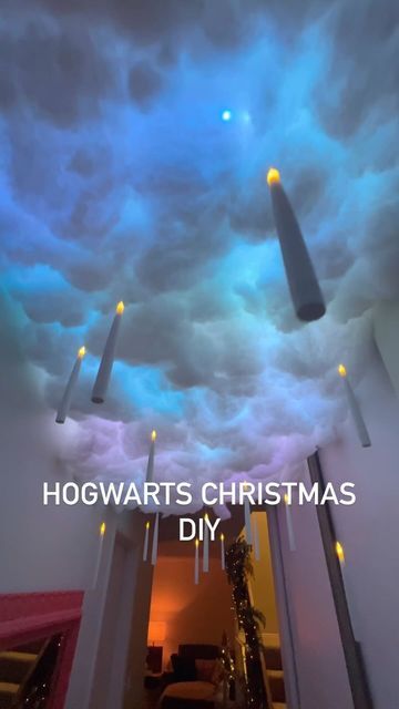 Danny Valimaki on Instagram: "Going a bit ham on the vibes this holiday. DIYed a Hogwarts floating candle hallway. JMTONE Floating Candles with Wand, 20 PCs https://a.co/d/fIuWy2B" Floating Ceiling Candles, Harry Potter Night Sky Ceiling, Decorating Ceiling For Christmas, Hogwarts Ceiling Diy, Hanging Clouds From Ceiling Diy, Harry Potter Ceiling Clouds, Hogwarts Christmas Party, Hogwarts Ceiling, Hogwarts Floating Candles