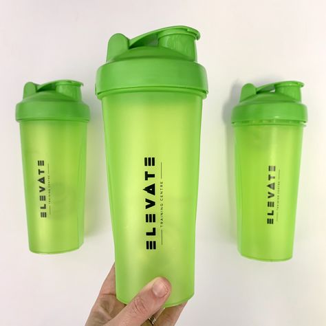 Branded gym protein shakers in Elevate brand colours. Gym merch can be the perfect gift, giveaway or to sell in the gym Gym Merchandise Ideas, Gym Merch, Gym Merchandise, Gym Protein, Industrial Clothing, Hi Vis Workwear, Brand Colours, Safety Workwear, Protein Shaker