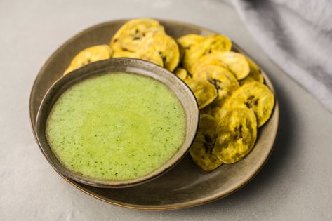 Mojito sauce, or mojo de ajo, is the preferred garlic dipping sauce for tostones (fried green plantains) and plantain fritters. Mofongo Recipe, Garlic Dipping Sauce, Plantain Fritters, Green Plantains, Cuban Bread, Dipping Sauces Recipes, Plantain Chips, Spanish Dishes, Green Sauce