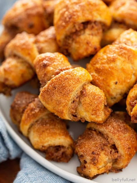 A soft, flaky pastry filled with sweet cinnamon-spiced nuts and dried cranberries, Rugelach may look and taste fancy, but they're surprisingly easy to make. Rugelach Cookies, Rugelach Recipe, German Christmas Traditions, Chicken Alfredo Bake, Jewish Foods, Hanukkah Party, Hanukkah Food, Bakery Items, Cinnamon Cake