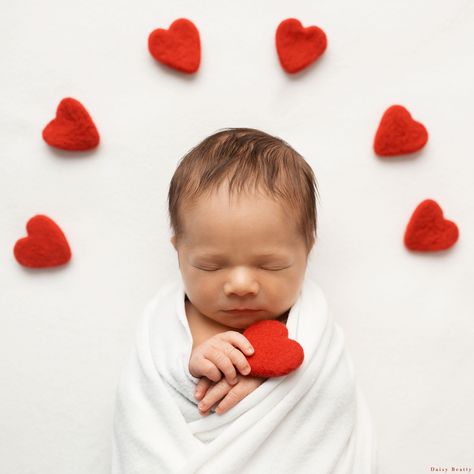 Will you be my Valentine? A Valentine's Day newborn baby. Newborn Valentines Photoshoot At Home, Valentine’s Day Newborn Photo Shoot, Valentines Day Newborn Photoshoot, Valentines Day Newborn Pictures, Valentine Newborn Pictures, February Newborn Pictures, Valentine’s Day Newborn Photos, Newborn Baby Valentines Photoshoot, Valentines Newborn Pictures