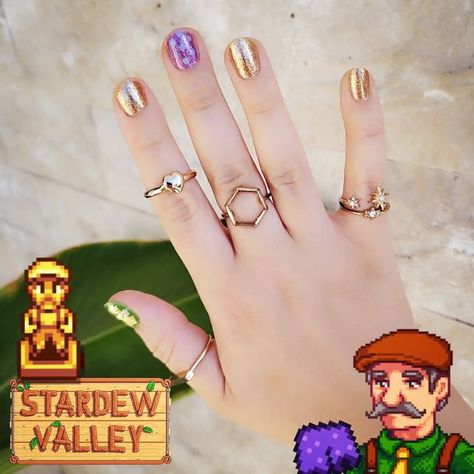 Thumb green with gold foil detail, middle purple with lighter purple dots, the rest shimmery gold. Stardew Nails, Stardew Valley Nails, Green Accent Nails, Nails Purple And Green, Pretty Fingers, Stardew Valley Fanart, Gold Statue, Purple Nail Art, Nails Purple