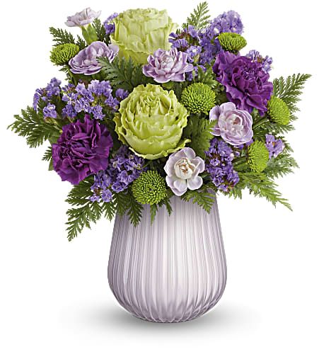 Purple And Cream Flower Arrangements, Purple Urn Arrangement, Peach And Purple Flower Arrangements, Purple And Yellow Floral Arrangement, Flower Dictionary, Poinsettia Care, Purple Carnations, Roses Purple, Green Roses