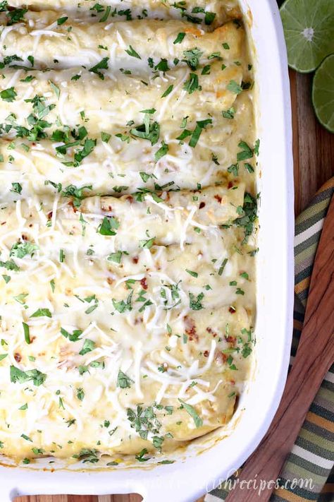 Pan of pulled pork enchiladas topped with green chili sauce and cheese. Pork Mexican, Chipotle Pulled Pork, Beef Burrito Recipe, Pulled Pork Enchiladas, Simple Dinner Recipes, Pork Enchiladas, Green Chili Sauce, Slow Cooked Pulled Pork, Green Chile Sauce