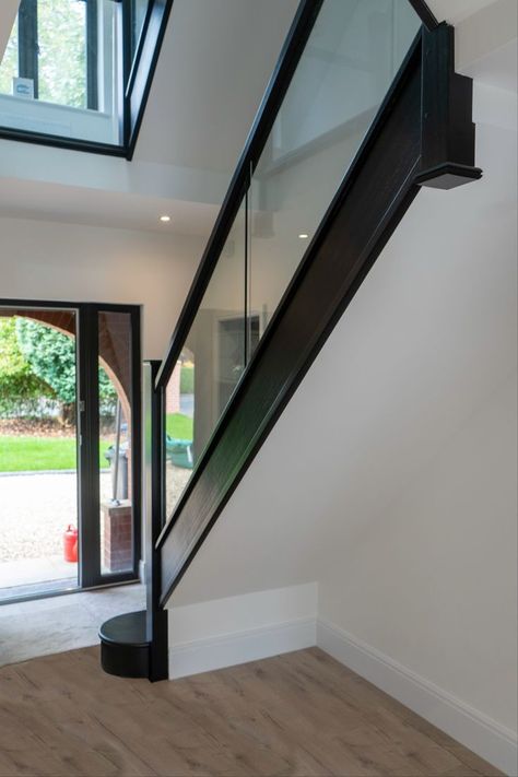 black embedded glass Glass Bannister, Cottage Staircase, Dark Staircase, Stairs Colours, Light Walls, Staircase Design Modern, Staircase Storage, Hallway Flooring, Glass Staircase